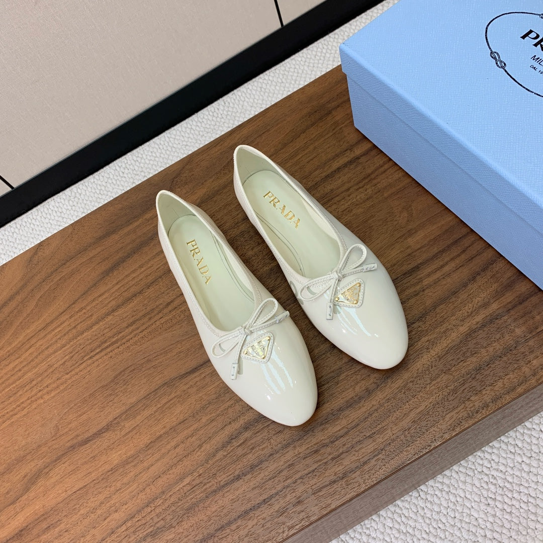 Prada 2026 Ballet Flats Bow Calfskin Patent Leather 792670