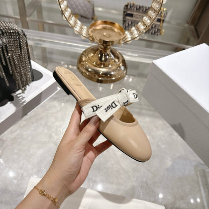 CD 26 Bow Flat Mules Embroidered Sheepskin