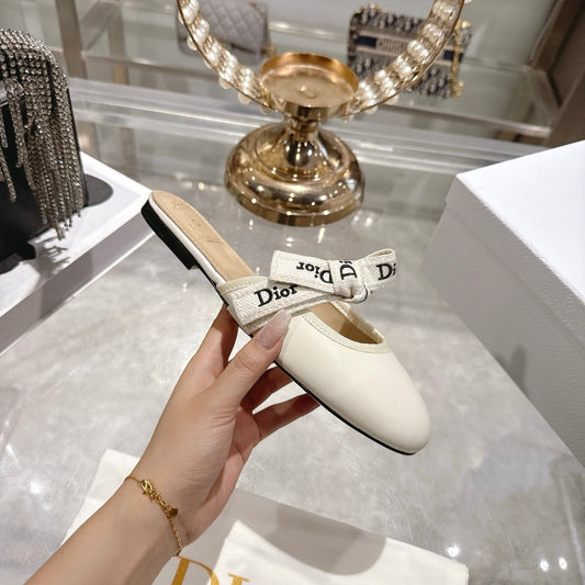 CD 26 Bow Flat Mules Embroidered Sheepskin