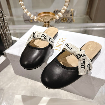 CD 26 Bow Flat Mules Embroidered Sheepskin