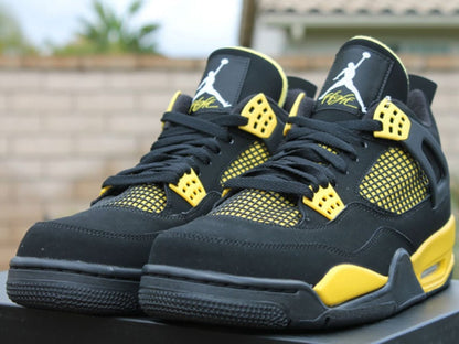 Jordan 4 Retro Thunder Sneakers - Modern Classic | Colorway of the Year
